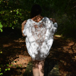 Walking in the woods in a white top